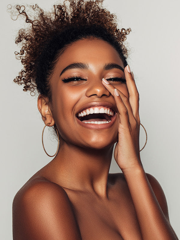 Lady smiling for the chris and alley experience mobile