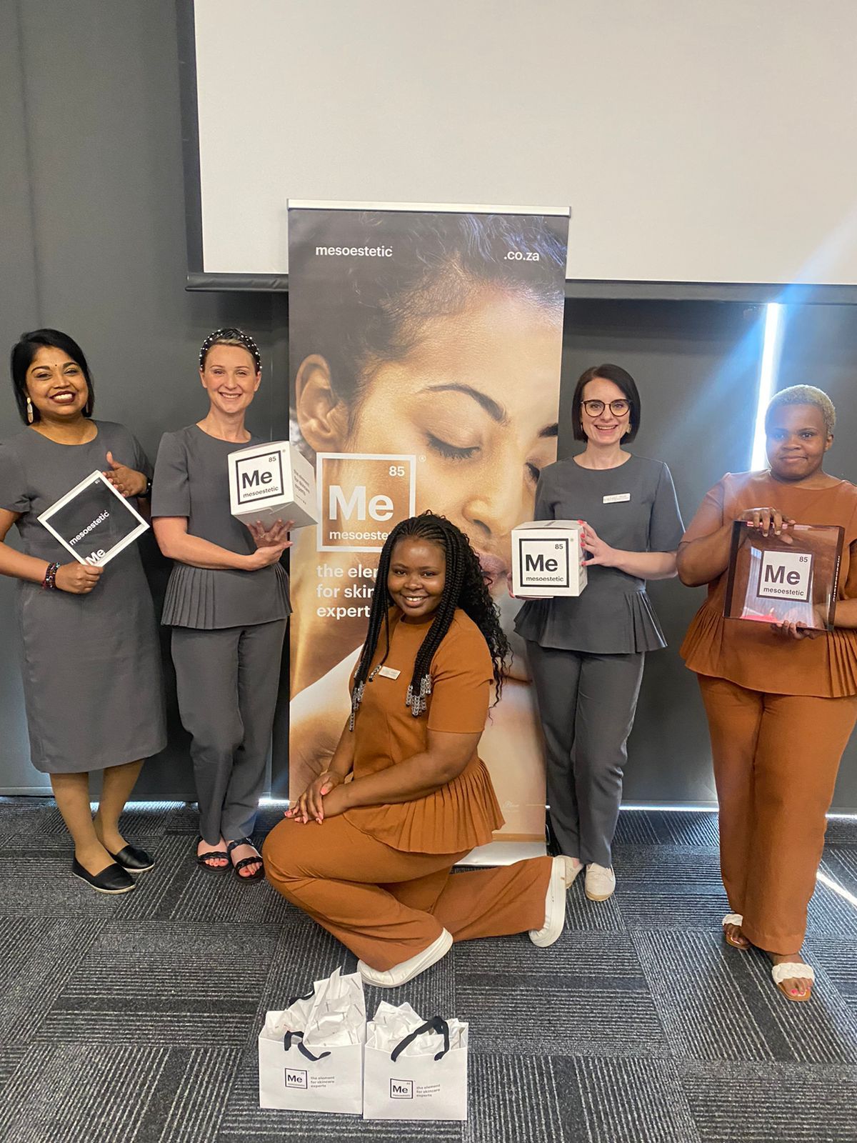 image of happy chris and alley staff winning awards